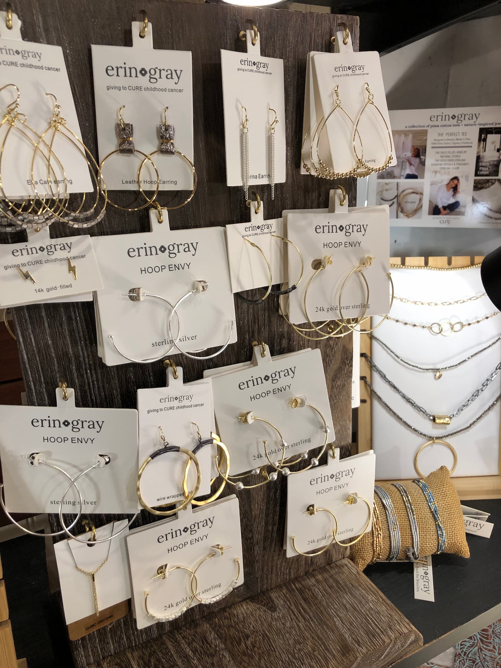Various hoop earrings hanging on display