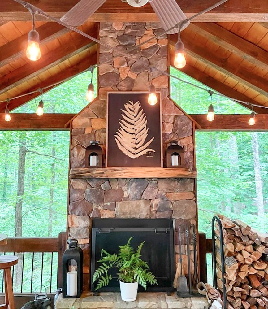 A rustic deck fireplace